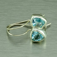 Load image into Gallery viewer, Blue topaz trillion cut silver earrings.