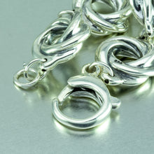 Load image into Gallery viewer, Eight sterling silver spirals make up this pretty linked sterling silver bracelet