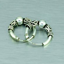 Load image into Gallery viewer, Tiny silver Balinese ethnic hoop earrings