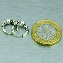 Load image into Gallery viewer, Tiny silver Balinese ethnic hoop earrings