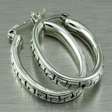 Cargar imagen en el visor de la galería, Large, oval hoop earrings with a Greek key motif design