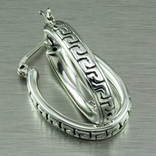 Cargar imagen en el visor de la galería, Large, oval hoop earrings with a Greek key motif design