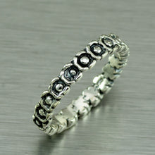 Load image into Gallery viewer, Sterling silver eternity ring of tiny flowers.