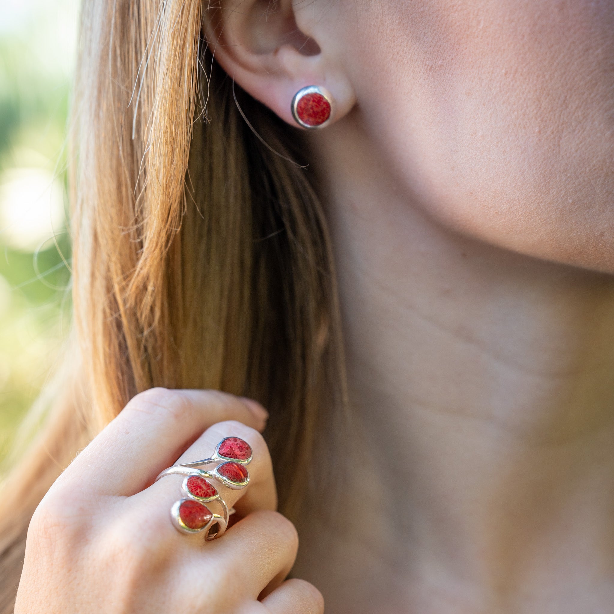 Coral studs sales