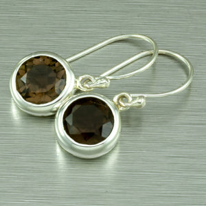 Small Amethyst Dangly Earrings. 92.5% Sterling Silver.