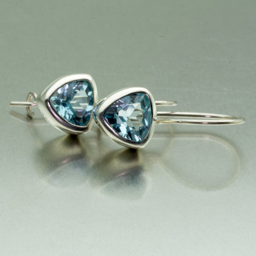 Blue topaz trillion cut silver earrings.