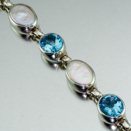 Large blue topaz and baroque pearl bracelet.