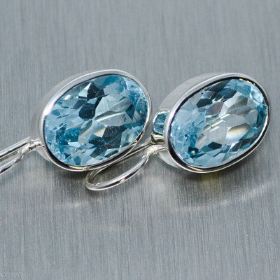 Large oval blue topaz earrings