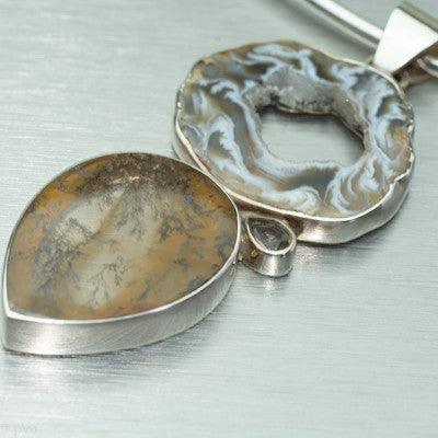 Large agate slice and dentritic agate silver pendant with tiny smokey quartz feature stone.