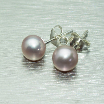 Peach freshwater pearl studs on sterling silver posts