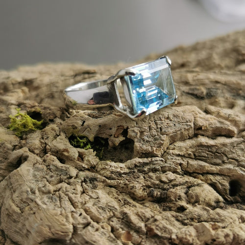 Emerald cut Blue topaz horizontal silver ring