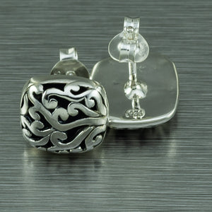 Pretty, square ajoure stud earrings.