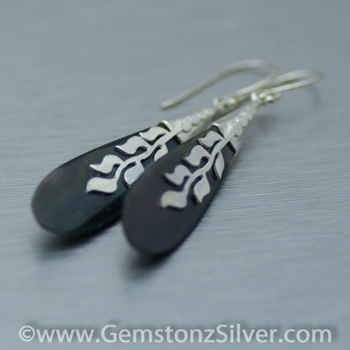 Long blacklip shell earrings with silver detail on front