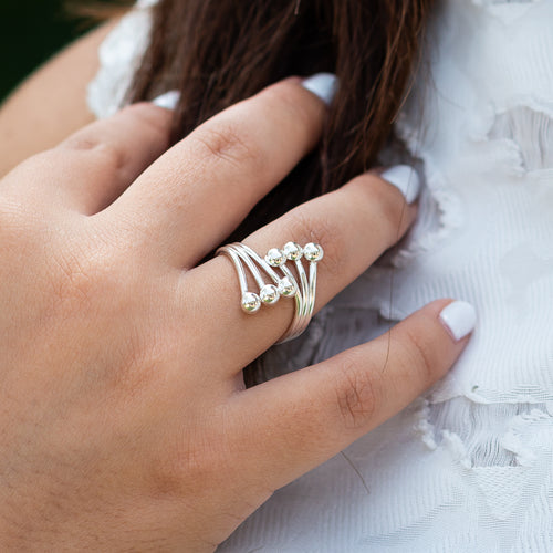 Six delicate silver balls on sterling silver ring