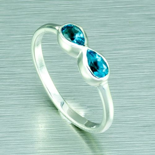Tiny Blue Topaz infinity ring