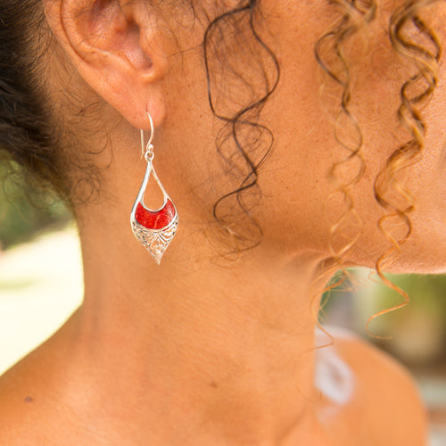 Elegant, long coral earrings.