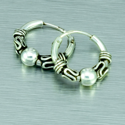 Tiny silver Balinese ethnic hoop earrings