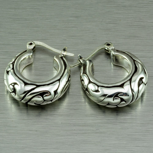 Ethnic silver huggie earrings