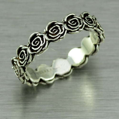 Sterling silver continuous rose stacking ring.
