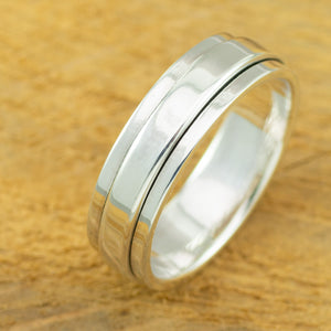 Polished sterling silver, plain mens spinner ring