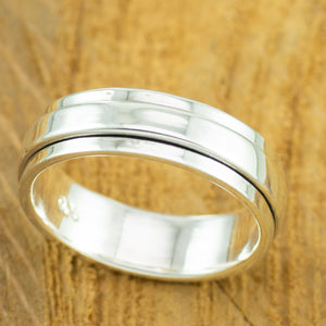 Polished sterling silver, plain mens spinner ring