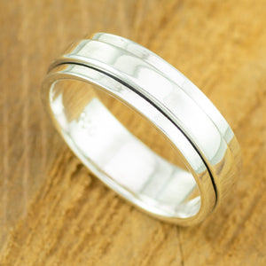 Polished sterling silver, plain mens spinner ring