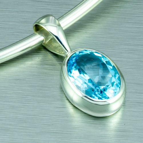 Blue topaz large oval sterling silver pendant.
