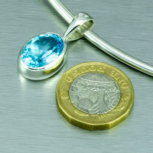 Blue topaz large oval sterling silver pendant.